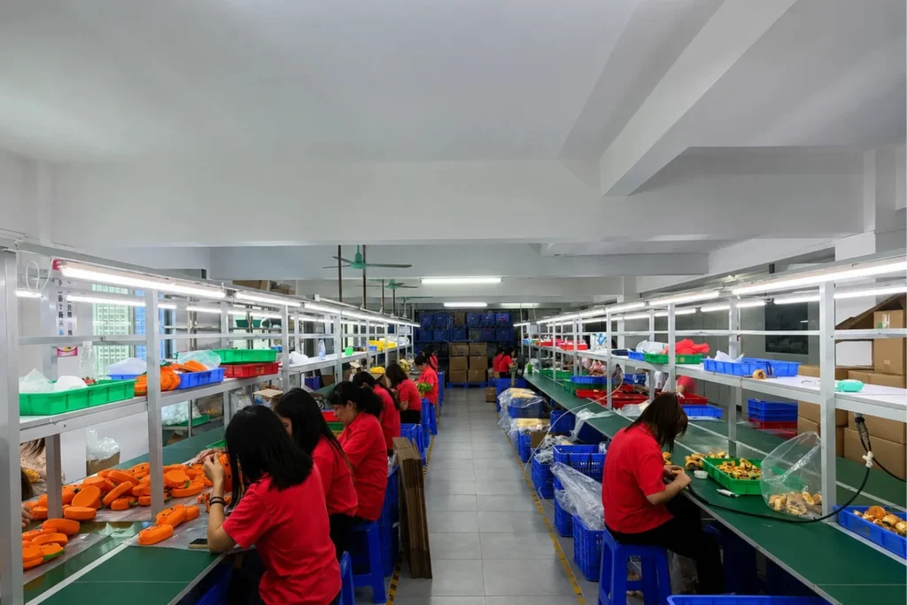 Production and assembly of custom tech accessories and PVC products in OEM manufacturing factory