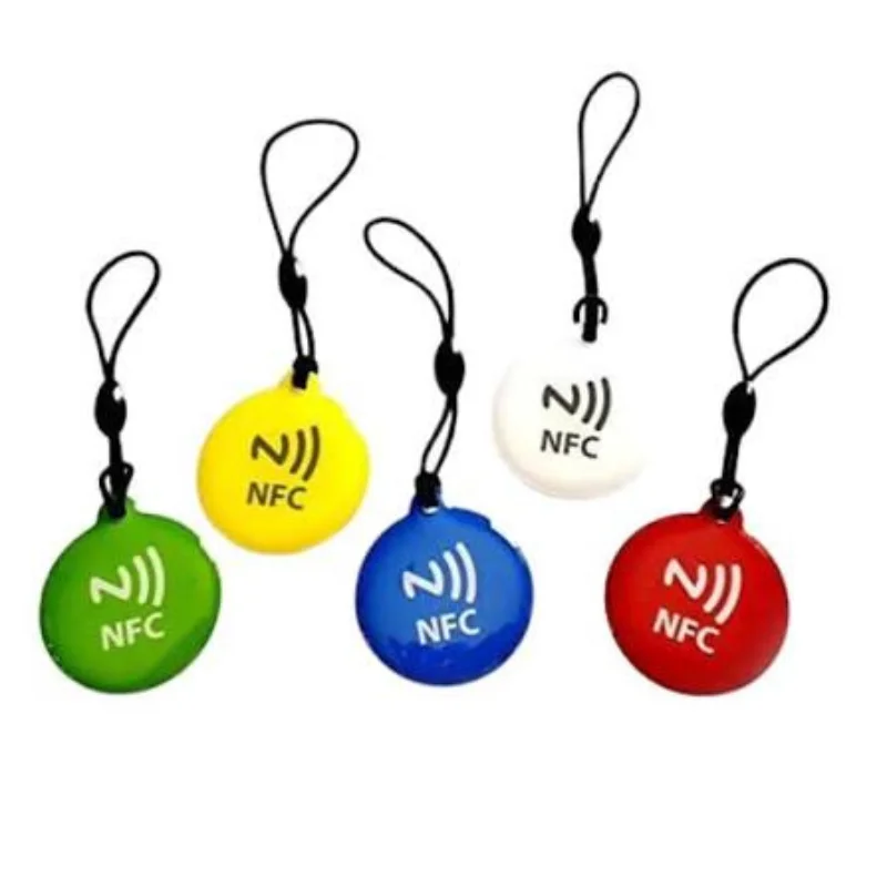 Custom NFC keychains and NFC magnets with branded designs.
